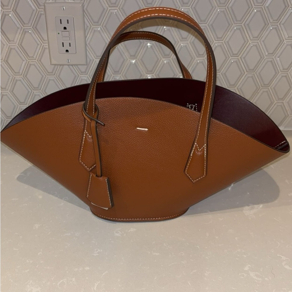 Brown Tote Bag with Unique Shell Shape and Smooth Texture